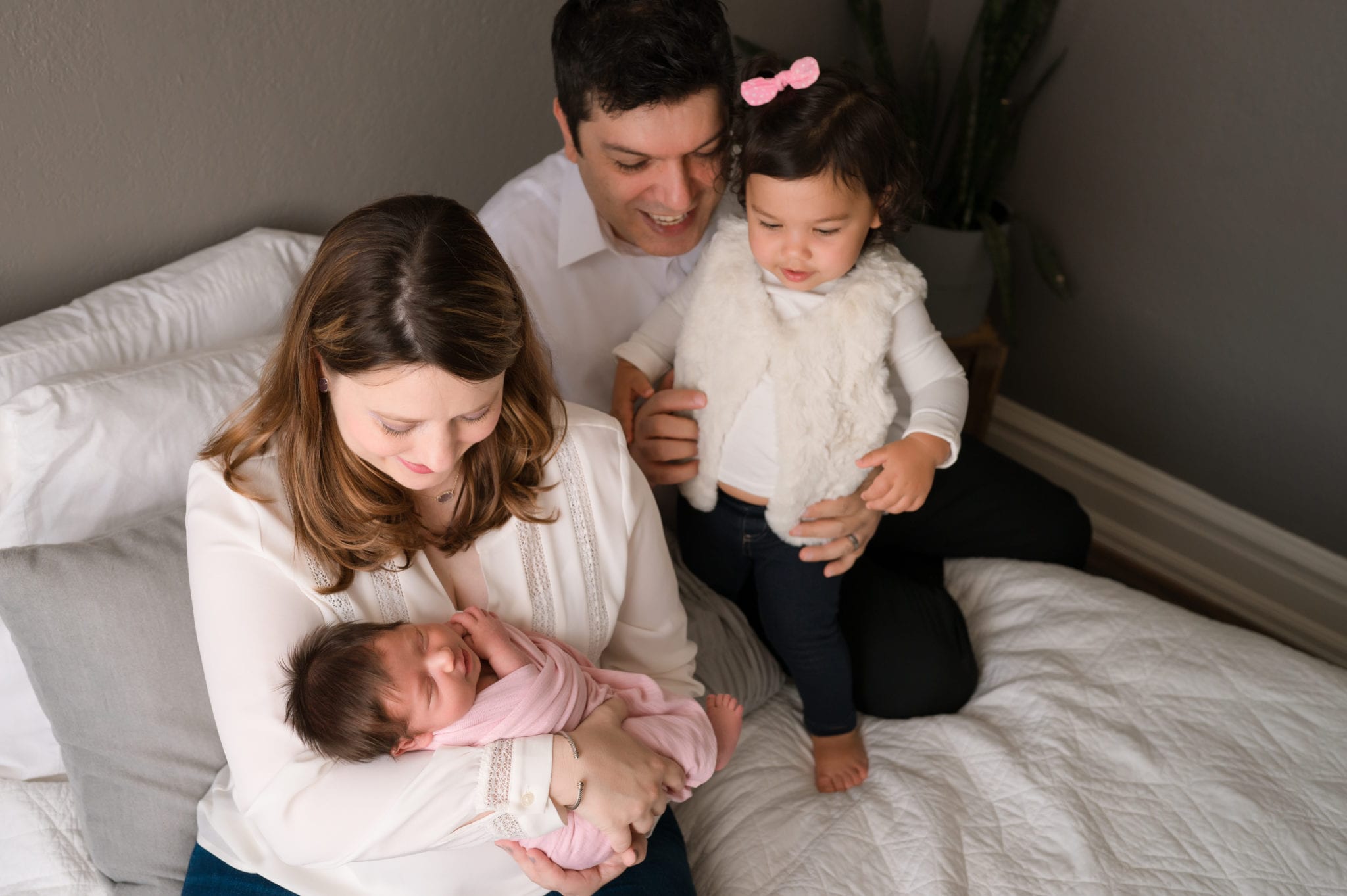 Loveland studio newborn photos with family