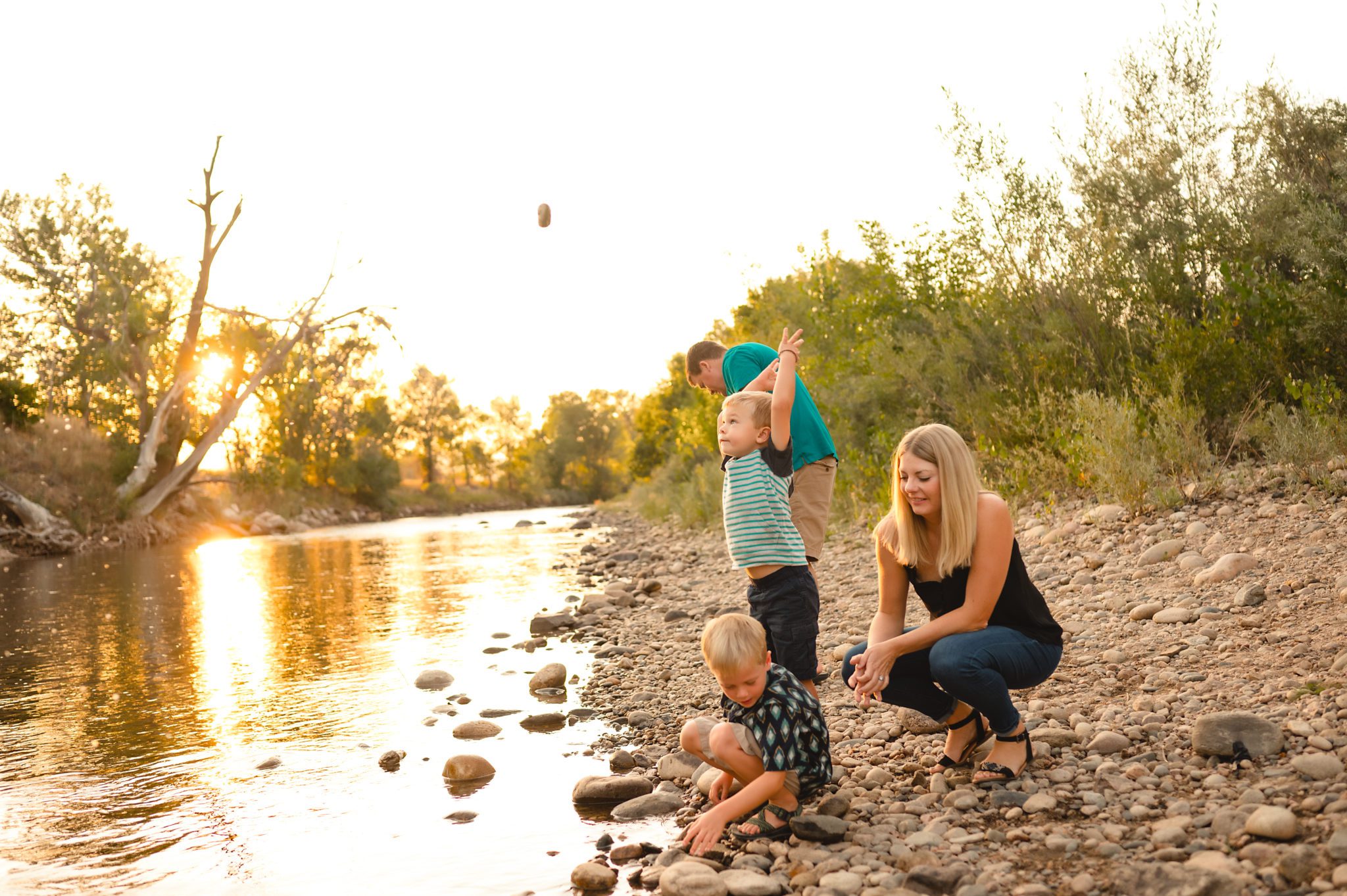 family playing in the poudre, fort collins, co